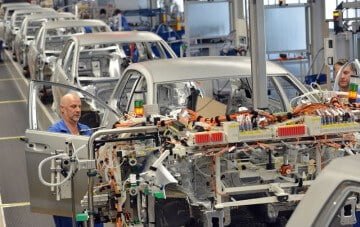 Cars Being Made in a Volkswagen Factory