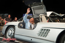 Sterlling Moss driving a Mercedes-Benz 300 SL Gullwing at Barrett Jackson Scottsdale 2014 sale