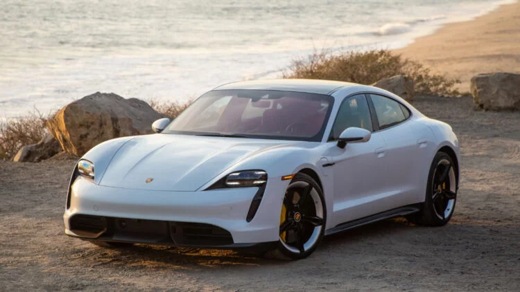 White Porsche Taycan
In 2020, Porsche sales in the USA contracted by 7%. The Macan and Cayenne were the top-selling models and the 911 the favorite sports car.